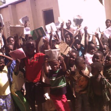 Picture of teachers and the students and the feeding program and classes